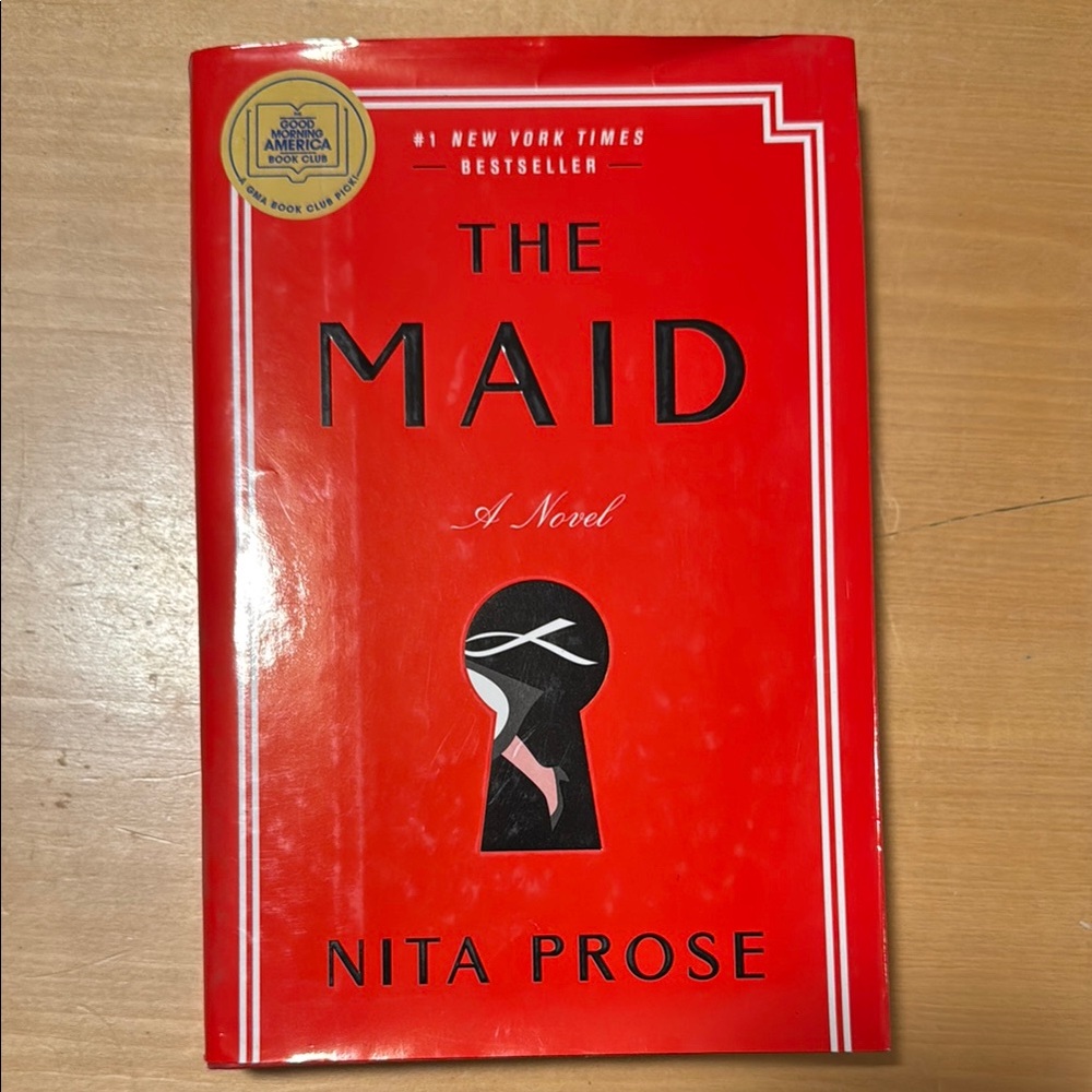 The Maid by Nita Prose - Red Hardcover Book